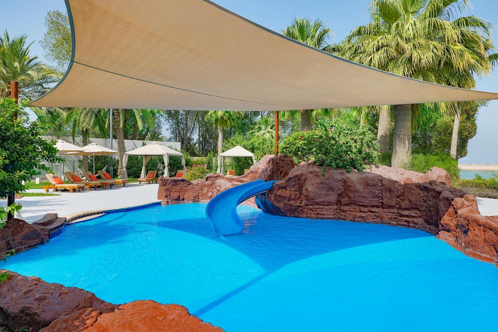 The Ritz-Carlton, Doha Hotel Ngoại thất bức ảnh Shade sail over a pool